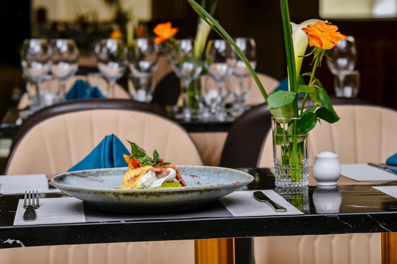 M Hotel Kigali Bagian luar foto