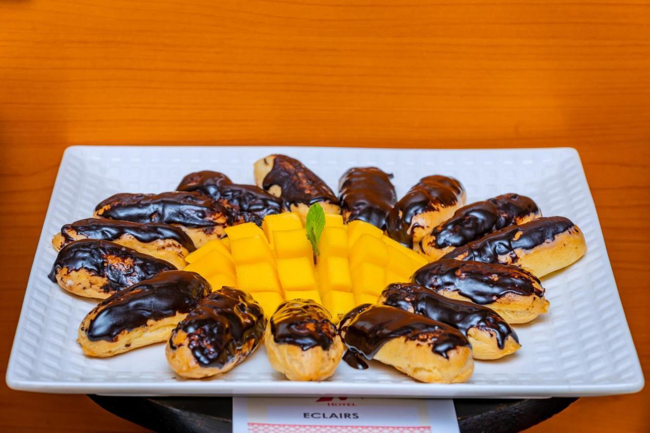 M Hotel Kigali Bagian luar foto