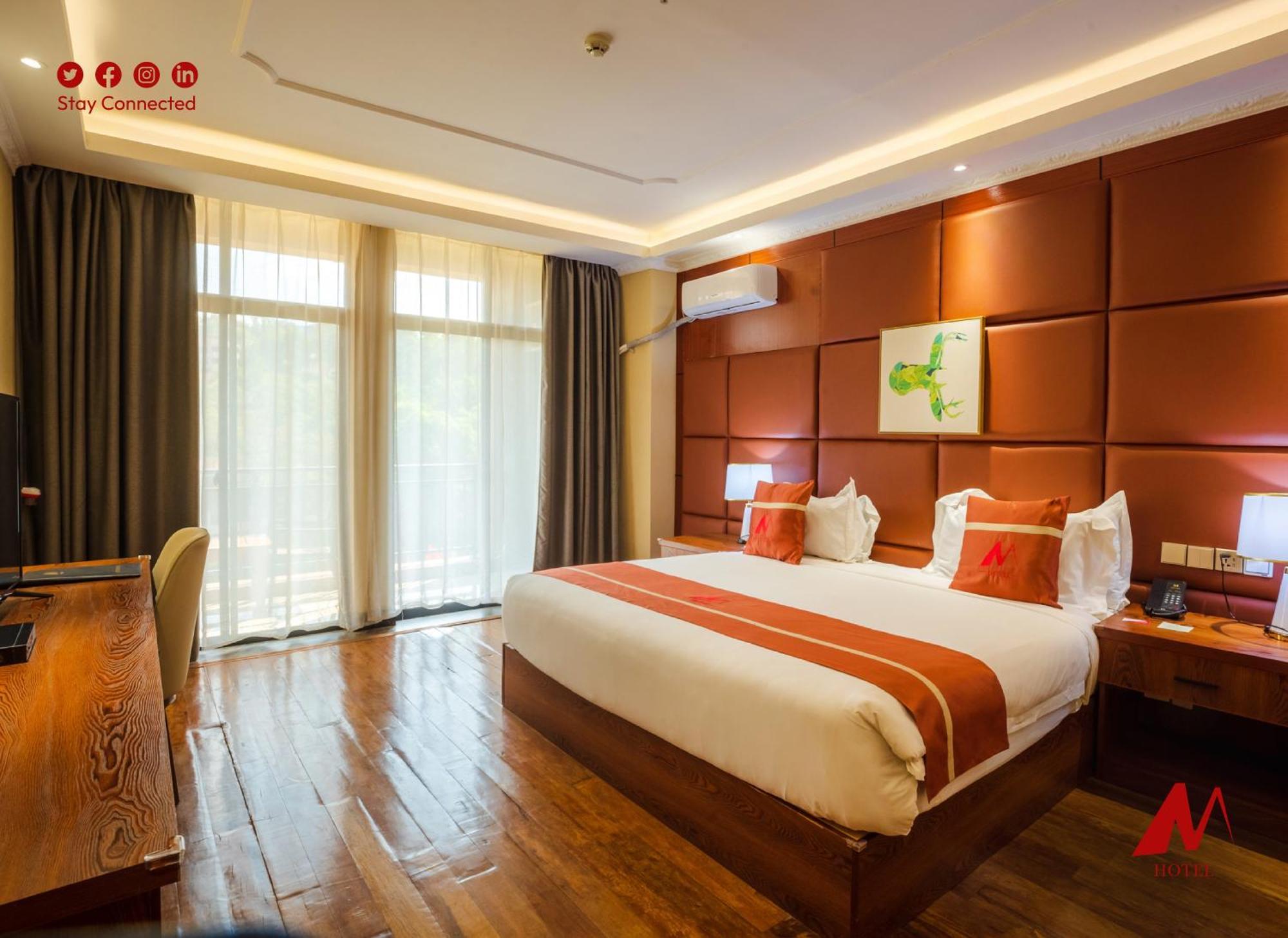M Hotel Kigali Bagian luar foto